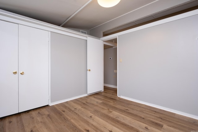 basement featuring light hardwood / wood-style flooring