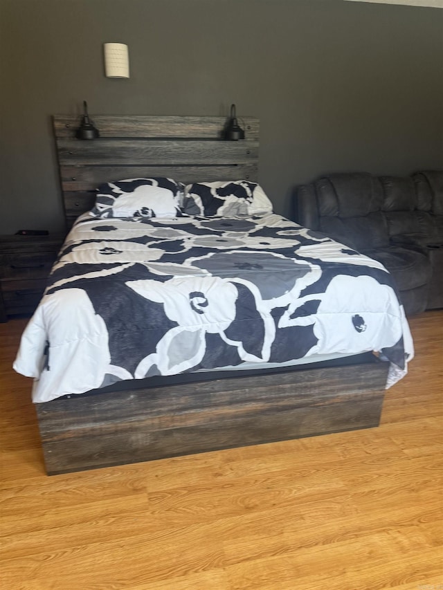 bedroom with light wood-style flooring