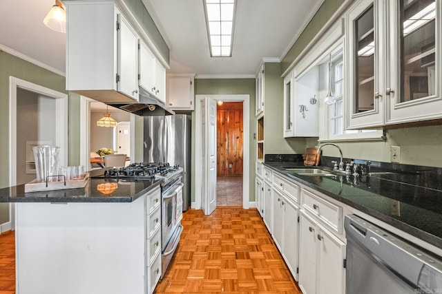 kitchen featuring white cabinets, dark stone counters, sink, and stainless steel appliances