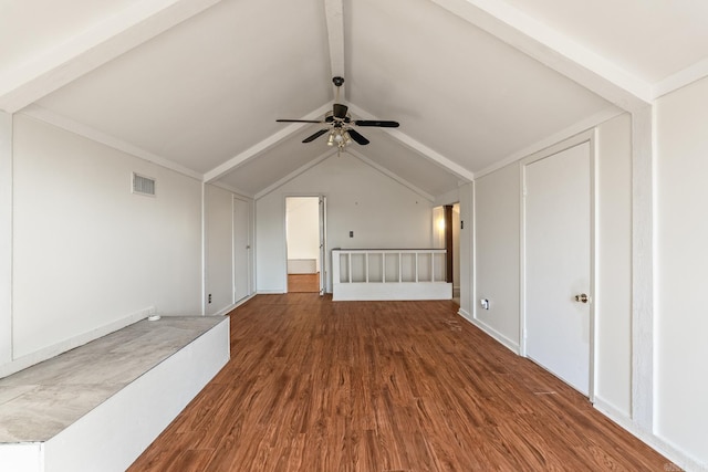 bonus room with ceiling fan, vaulted ceiling with beams, and wood-type flooring