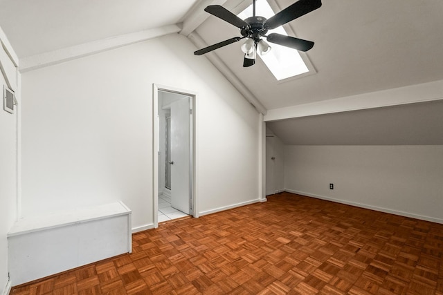 bonus room featuring ceiling fan, vaulted ceiling with beams, and parquet flooring