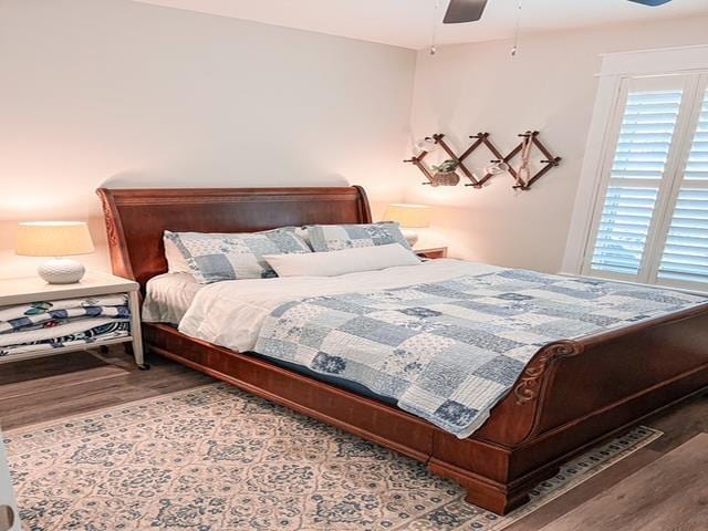 bedroom featuring hardwood / wood-style floors and ceiling fan