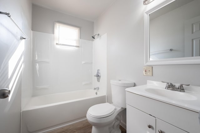 full bathroom with toilet, vanity, wood-type flooring, and shower / bath combination