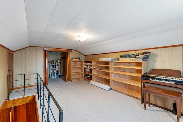 bonus room featuring light carpet and vaulted ceiling