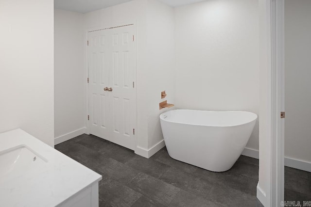 bathroom featuring a bathtub and vanity