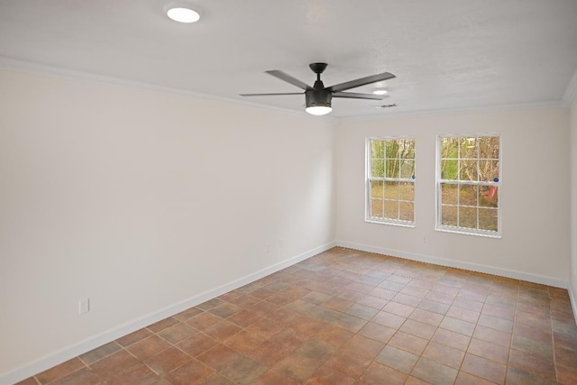 spare room with ceiling fan and crown molding