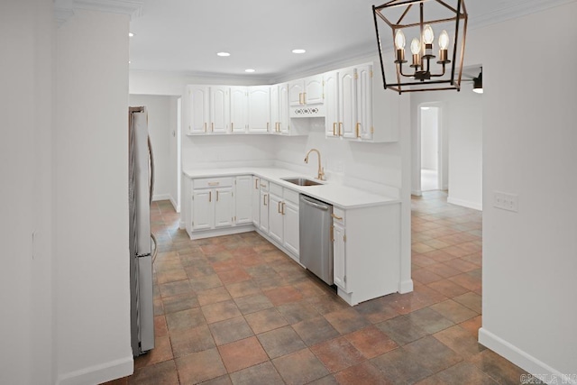 kitchen featuring white cabinets, appliances with stainless steel finishes, decorative light fixtures, sink, and crown molding