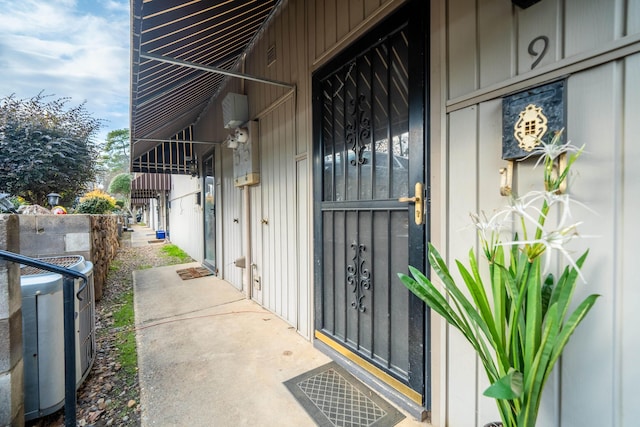 entrance to property with central AC unit