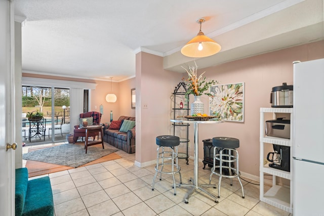 tiled living room featuring crown molding