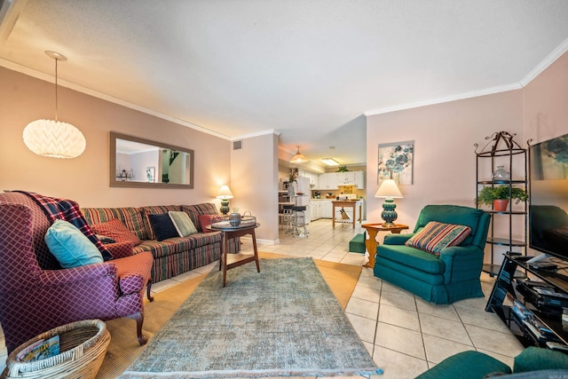 living room featuring light tile patterned flooring, ornamental molding, and a textured ceiling