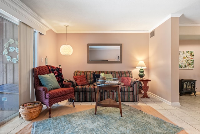 living room with a wood stove, crown molding, and light tile patterned flooring