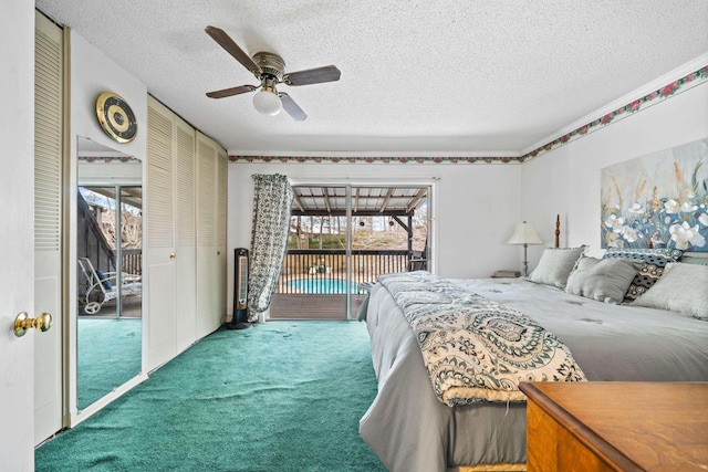 bedroom featuring a textured ceiling, ceiling fan, access to exterior, and carpet floors