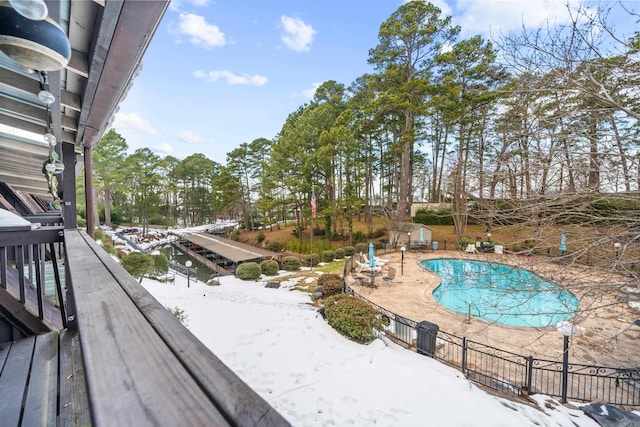 view of snow covered pool