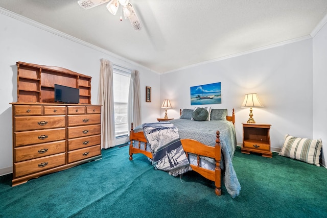 bedroom featuring ceiling fan, crown molding, and dark colored carpet