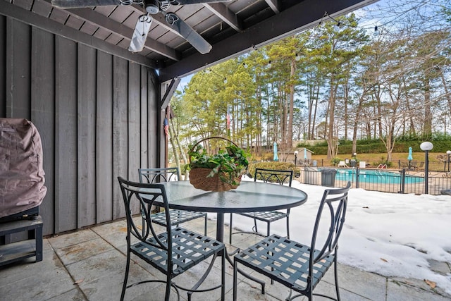 view of patio featuring ceiling fan