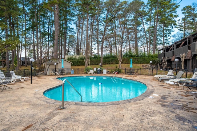 view of pool featuring a patio