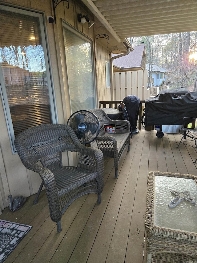 deck featuring a grill