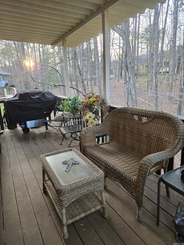 wooden terrace featuring area for grilling