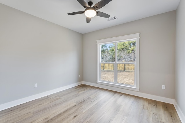 unfurnished room with ceiling fan and light hardwood / wood-style flooring