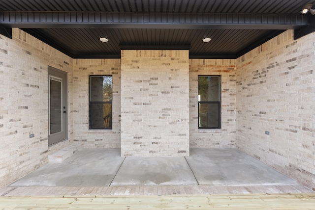 entrance to property with a patio area