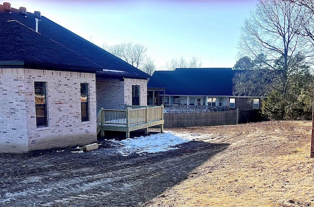 view of yard with a wooden deck