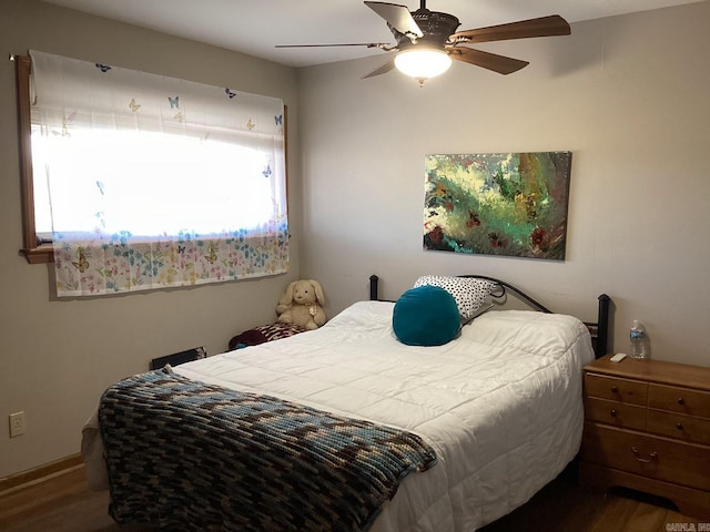 bedroom featuring ceiling fan and hardwood / wood-style floors