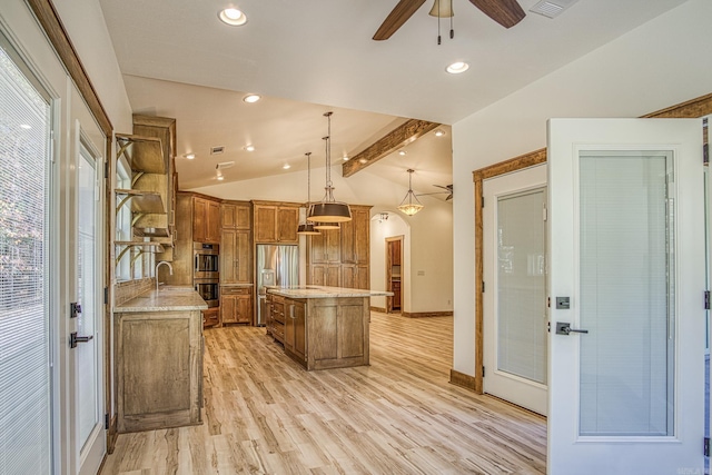 kitchen with a center island, hanging light fixtures, stainless steel fridge, lofted ceiling with beams, and ceiling fan