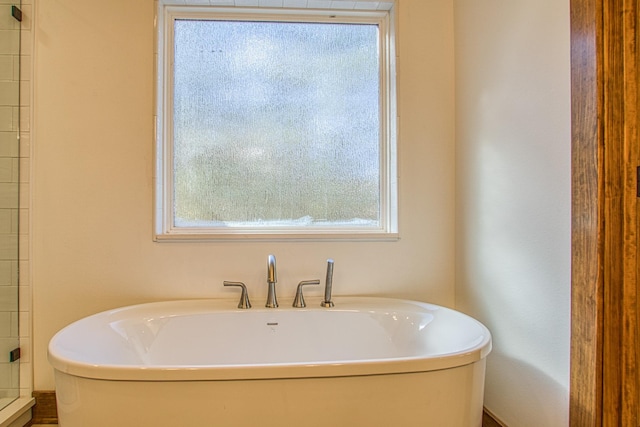 bathroom with a bath