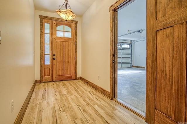 foyer featuring light wood-type flooring