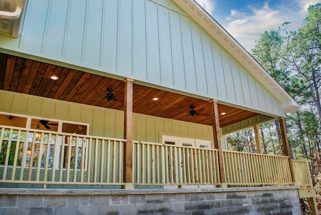 exterior space with ceiling fan and a balcony