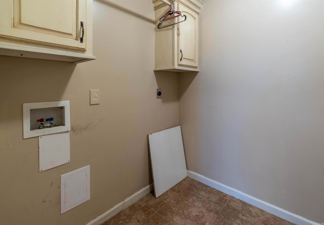 clothes washing area featuring hookup for a washing machine, cabinets, electric dryer hookup, and tile patterned flooring