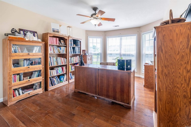 office area featuring ceiling fan and dark wood-type flooring