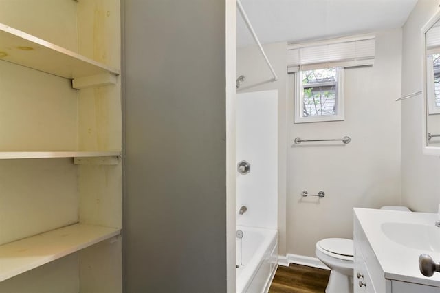 full bathroom with shower / bath combination, toilet, vanity, and hardwood / wood-style floors