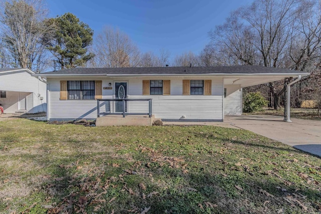 single story home featuring a front lawn and a carport