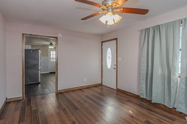 entryway featuring ceiling fan and dark hardwood / wood-style flooring