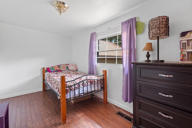 bedroom featuring hardwood / wood-style floors