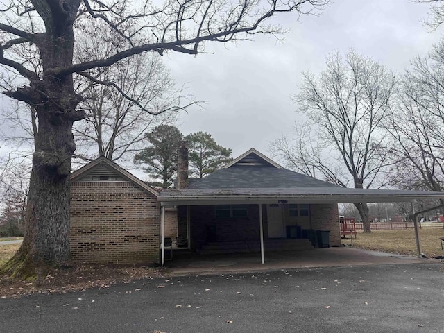 view of front of house with a carport