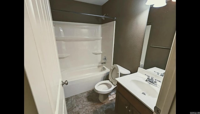 full bathroom with shower / tub combination, vanity, and toilet