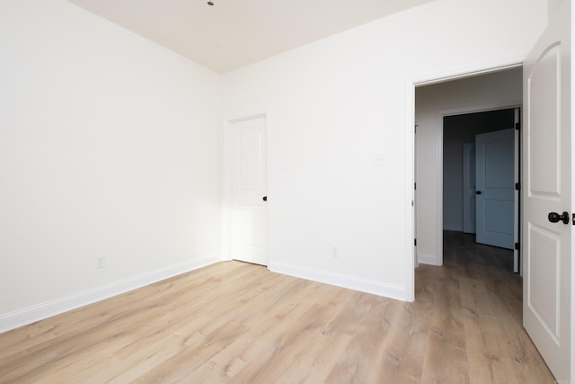 empty room with light wood-type flooring