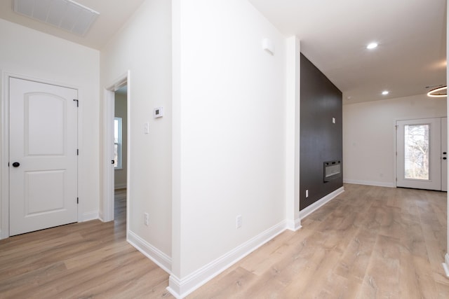 foyer entrance featuring light wood-type flooring