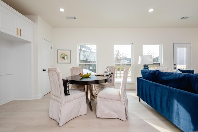 dining room featuring light hardwood / wood-style floors