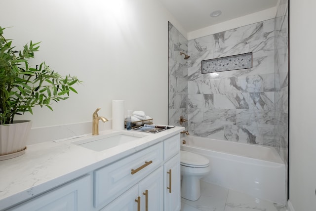 full bathroom with toilet, vanity, and tiled shower / bath combo