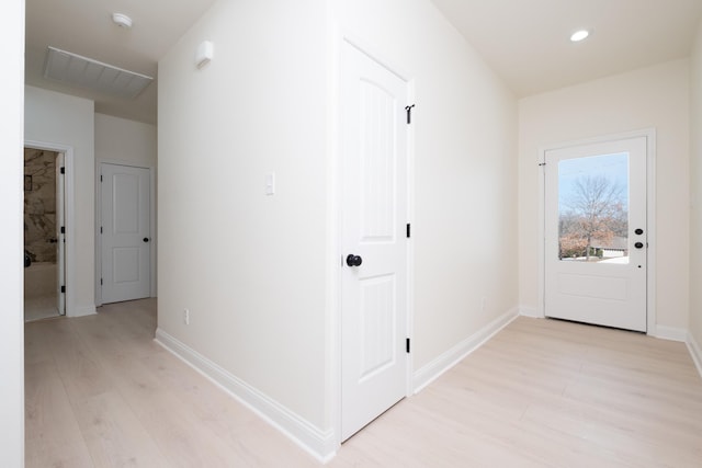 hallway featuring light hardwood / wood-style flooring