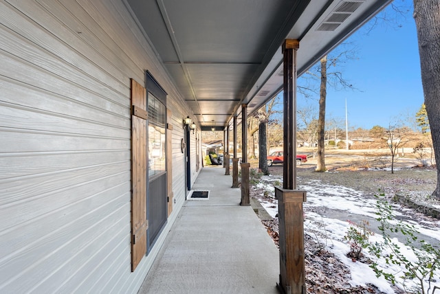 view of snow covered patio