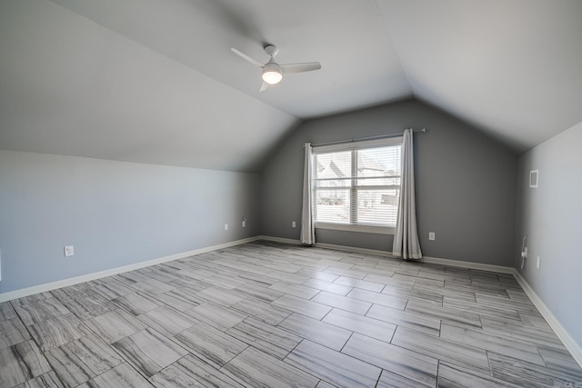 bonus room featuring ceiling fan and vaulted ceiling