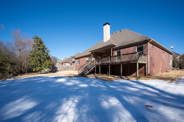 back of property featuring a deck