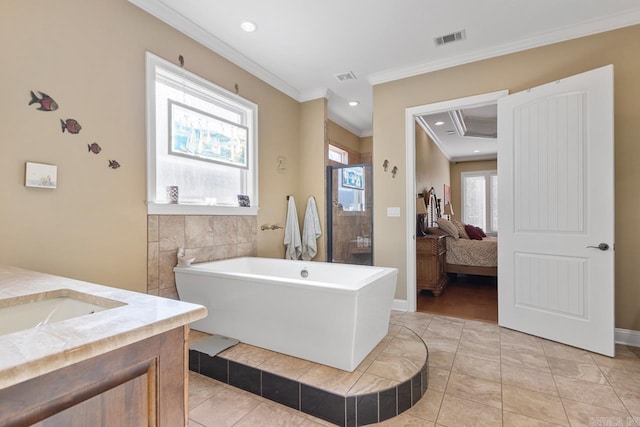 bathroom featuring vanity, a bathtub, and crown molding