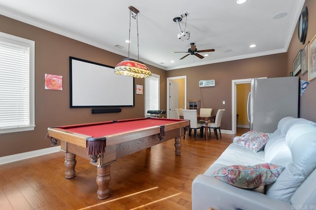 game room with hardwood / wood-style flooring, pool table, crown molding, and ceiling fan