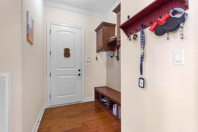 mudroom featuring crown molding and hardwood / wood-style flooring