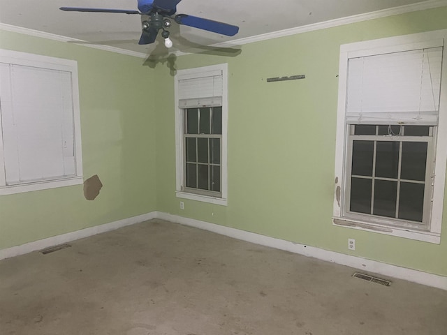 unfurnished room featuring ceiling fan and ornamental molding